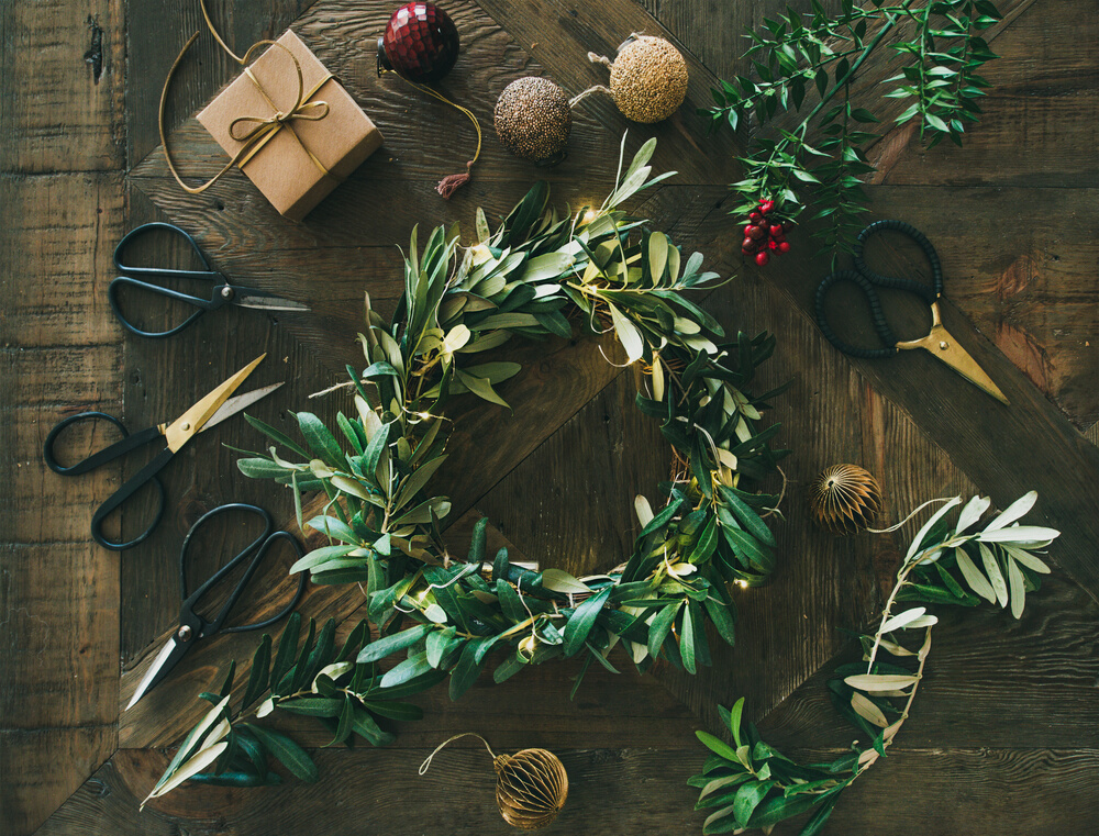 Flat-lay of Christmas decoration toys and wreath